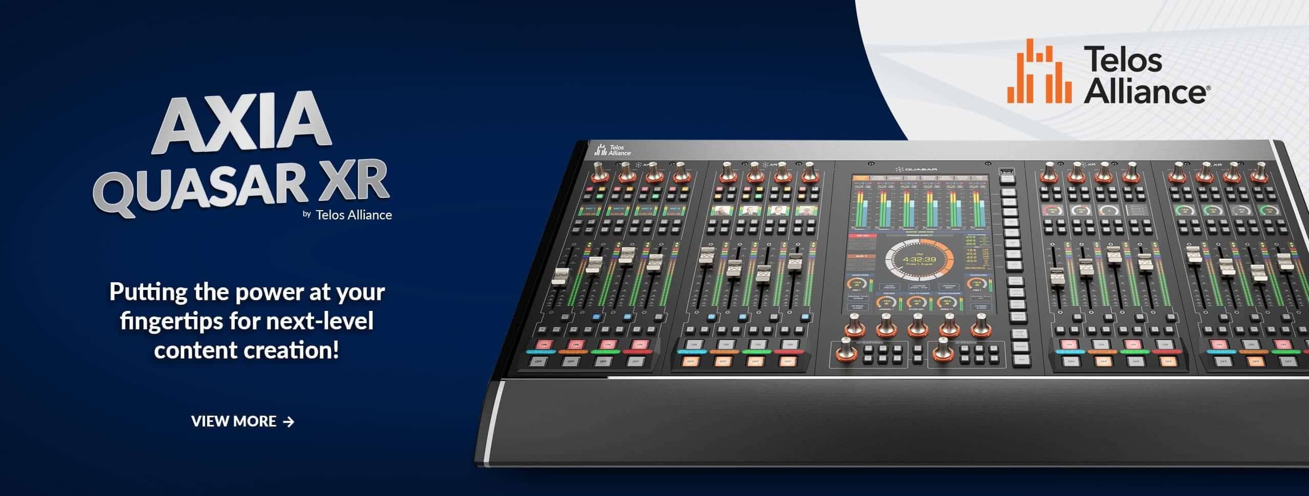 Banner Consola de mezclas de audio profesional AXIA Quasar XR con faders y botones iluminados, pantalla de indicadores gráficos, de Telos Alliance para producción de contenido avanzado.